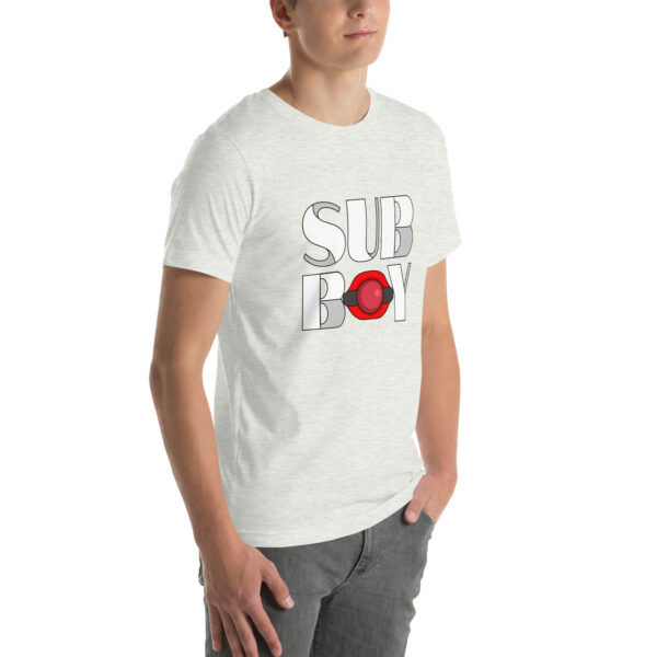 A person wearing the "Sub Boy" light gray t-shirt, featuring a red circle design and text, paired with dark gray pants.