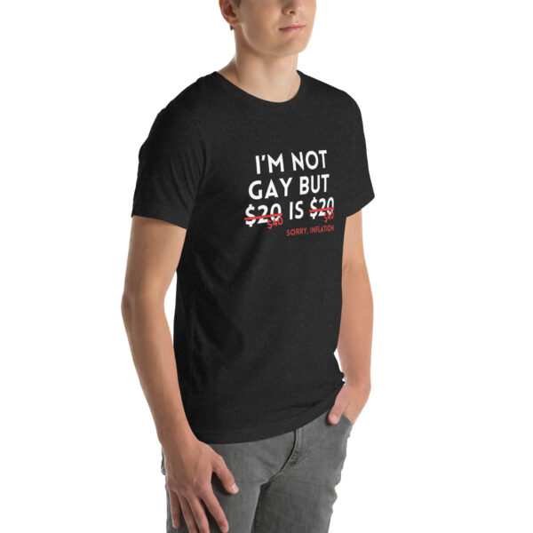 Person wearing an "I'm Not Gay" t-shirt in black, featuring humorous text referencing inflation and a $20 amount.