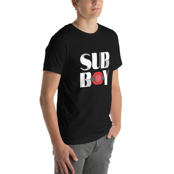 A person is wearing a black Sub Boy t-shirt featuring a red and white design, standing against a plain background.