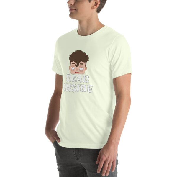 An individual dressed in a light-colored T-shirt featuring the cartoon face and text from the "Dead Inside" product.