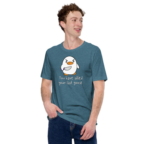 A person wearing a blue T-shirt featuring a cartoon bird and the phrase "You Have Sillied Your Last Goose.