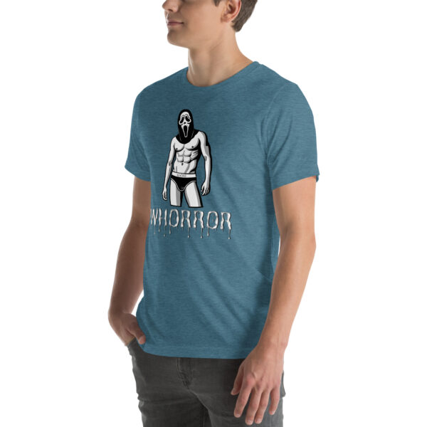 Man in blue t-shirt featuring the "Whorror" design with a masked, muscular figure and dripping font text.