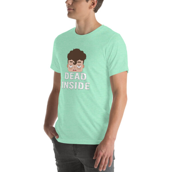 Person dressed in a light green "Dead Inside" T-shirt featuring a cartoon face and text.