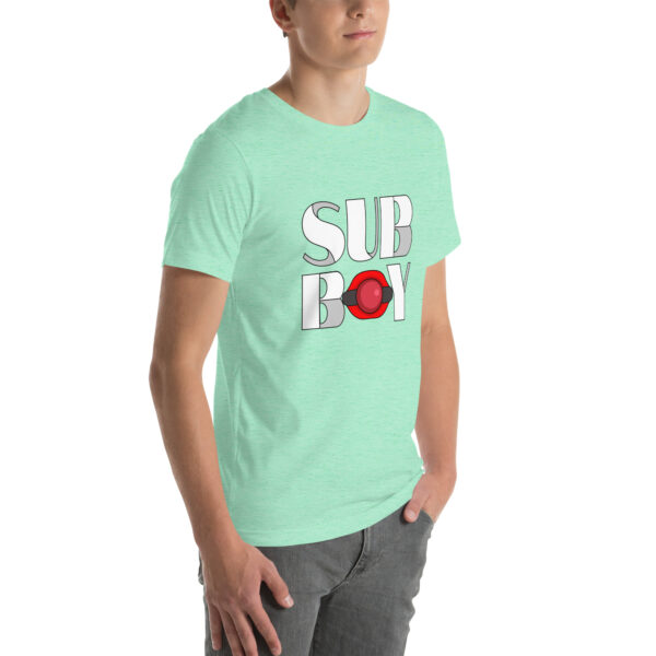 A person is wearing a Sub Boy light green t-shirt featuring the "SUB BOY" text and a red dot design, standing against a white background.