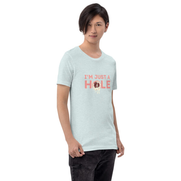 A person wearing a light green "I'm Just a Hole" t-shirt.