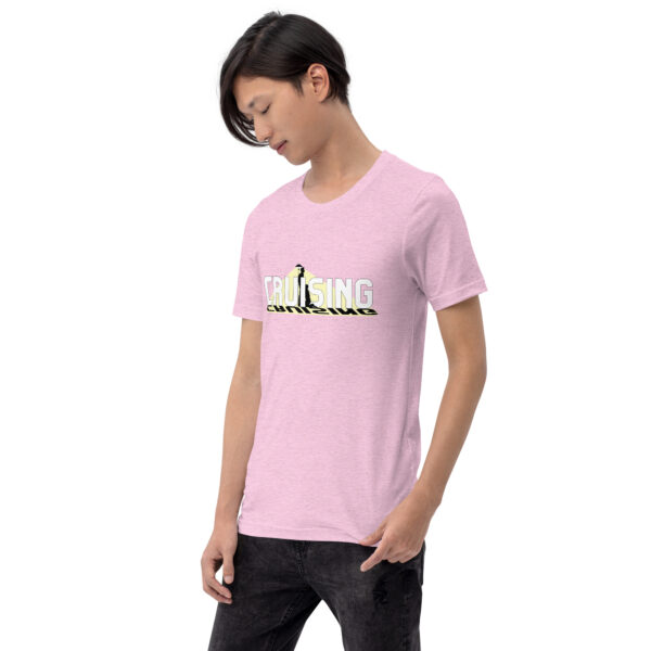 Person wearing a pink t-shirt with the product name "Cruising" on it, standing against a plain white background.