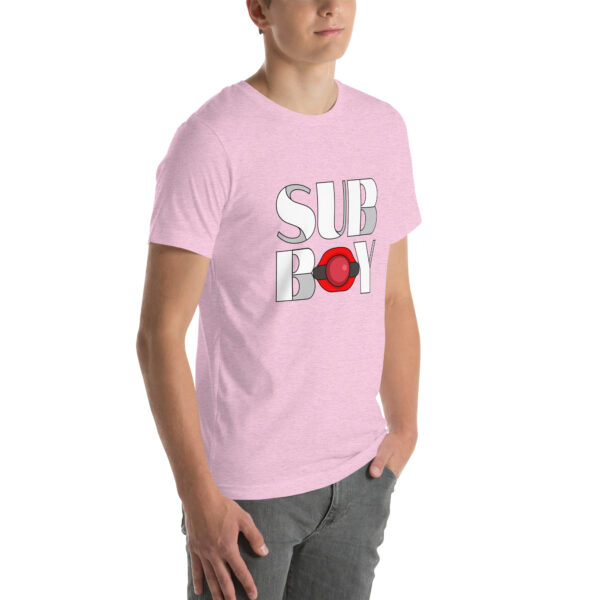 Person wearing a pink T-shirt featuring the "Sub Boy" design, standing with hands in pockets.