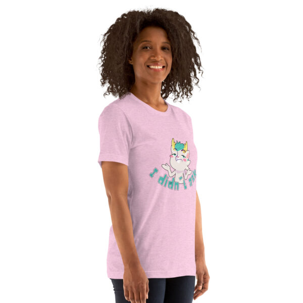 A person wearing a pink t-shirt featuring a cartoon cat with the text "I Didn't Asl.