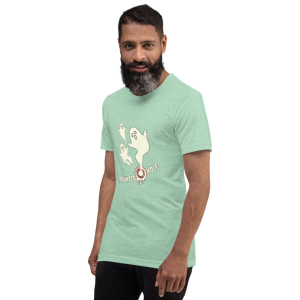 Man with a beard wearing a green "Haunted Hole" T-shirt featuring a ghost graphic.