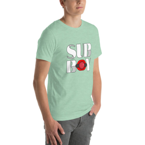 A person wearing a light green "Sub Boy" T-shirt, featuring the text and a red circle design on the front.