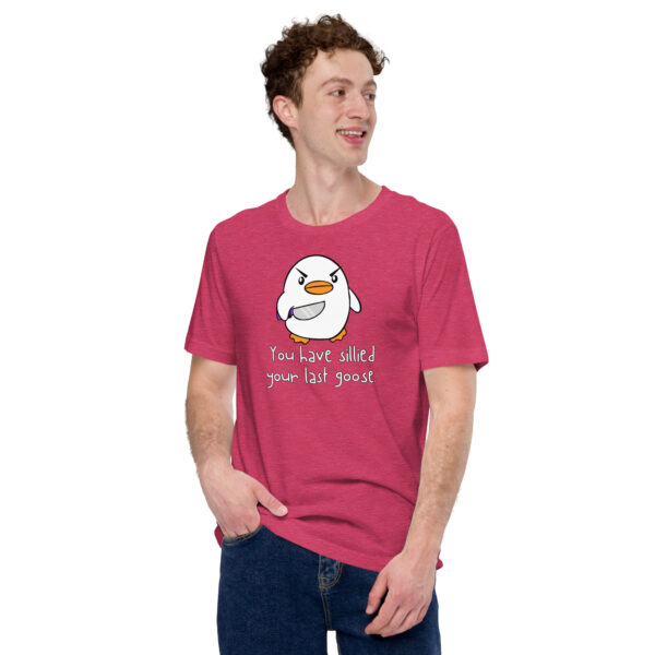 A person wearing a red t-shirt featuring an illustrated bird and the text "You Have Sillied Your Last Goose.