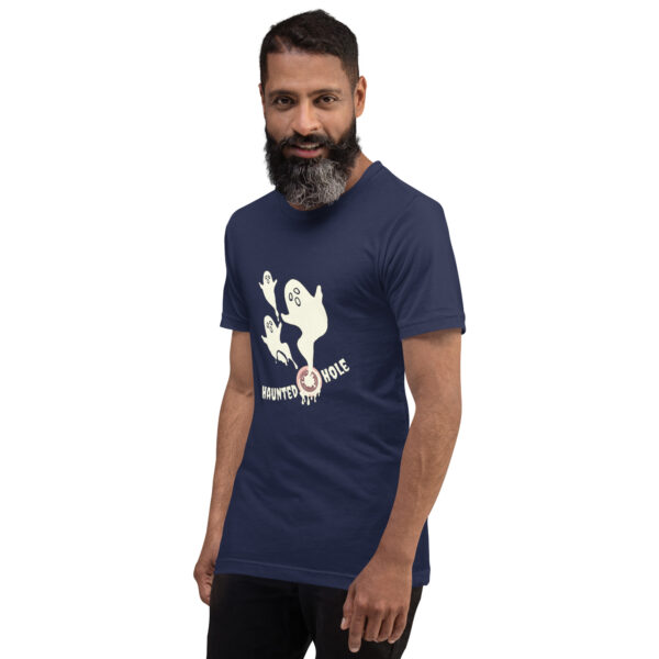 A person with a beard wearing a navy blue t-shirt featuring a ghost graphic and the text "Haunted Hole.