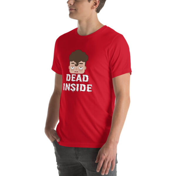 A person wearing a red t-shirt featuring a cartoon face and the text "Dead Inside.