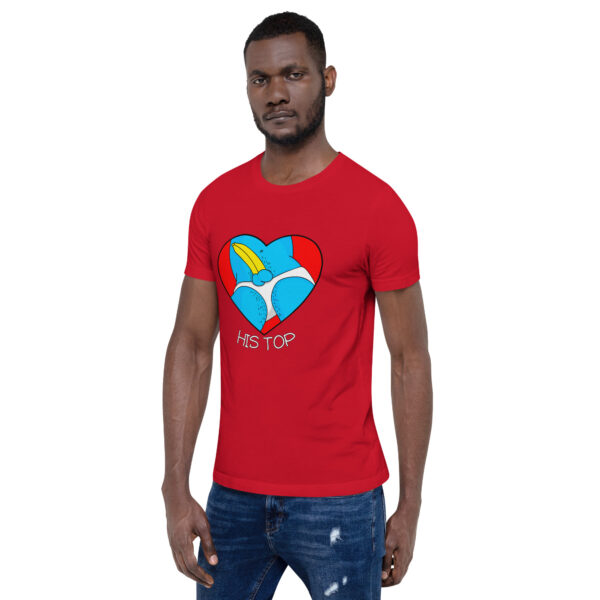 Man wearing a red t-shirt featuring a cartoon heart and blue bird design with the words "His Top.