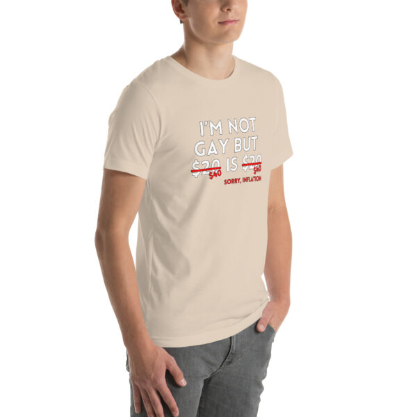 Person wearing an "I'm Not Gay" T-shirt in beige with the text: "I'm not gay but $20 is $20, sorry, inflation," where "$20" is crossed out and replaced with "$40.