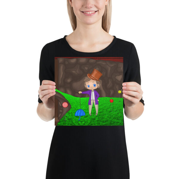 A person holding a square print of the Wanka design, showcasing a cartoon character wearing a purple coat, brown hat, and holding a blue umbrella, standing on green grass with a brown background.