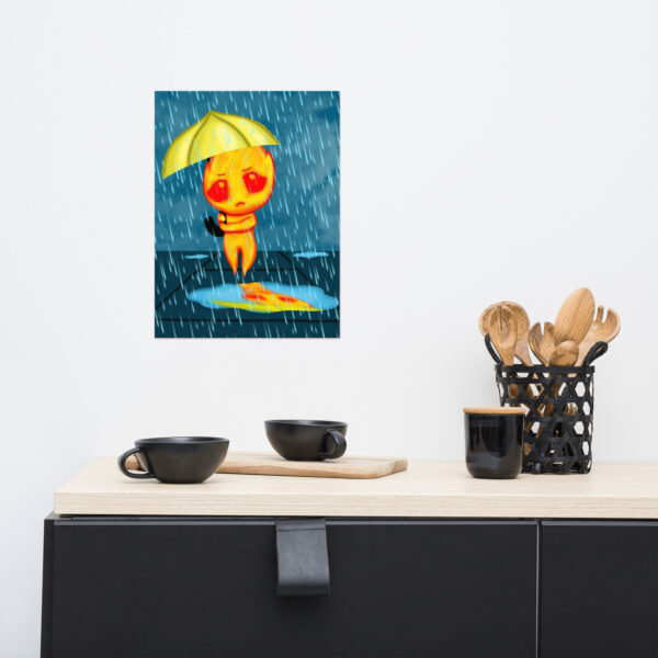 A wall print titled "Flick" featuring an animated character holding an umbrella in the rain is displayed above a black cabinet, which also features a cutting board, two black cups, and a basket of wooden utensils.