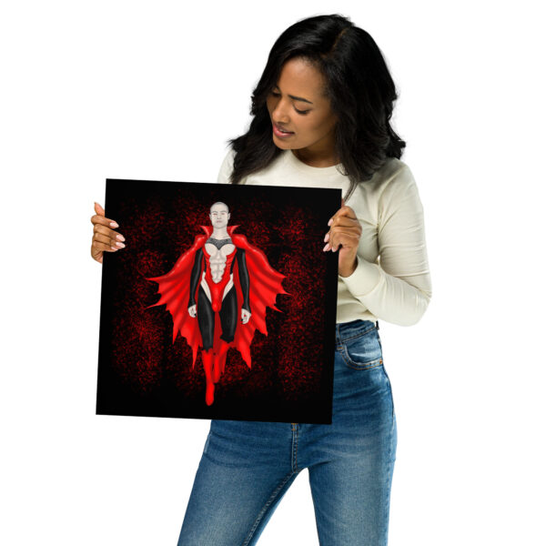 A person holds a square poster featuring Count Matthew Clyde, a superhero with a red cape and costume.