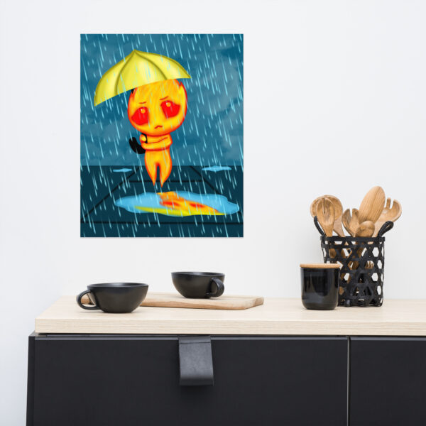 A wall art piece titled "Flick," featuring an orange figure holding a yellow umbrella in the rain, is displayed above a black countertop adorned with wooden utensils and black cups.