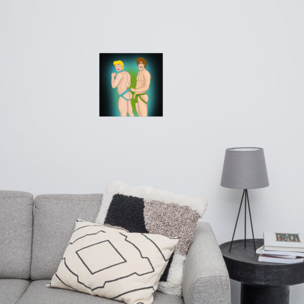 The "Shaggy and Fred" artwork depicts two men in green shorts, standing back-to-back. It is showcased on a white wall above a gray couch next to a side table with a lamp.