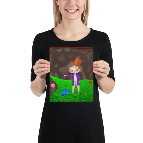 Person holding a drawing of Wanka, a character in a purple coat and top hat standing on green grass with a cane.