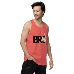 A person wearing the "Bro Tank," a red sleeveless shirt featuring the word "BRO" and a flexing arm graphic, is standing with one hand in their pocket.