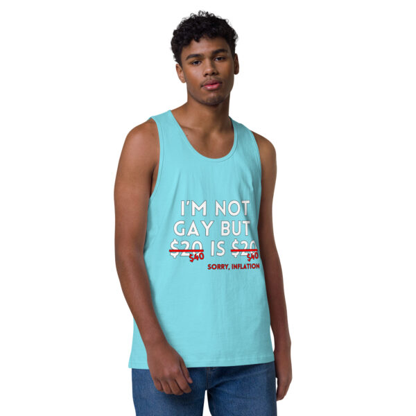 A person wearing the "I'm Not Gay Tank," a light blue tank top that humorously references inflation and pricing.