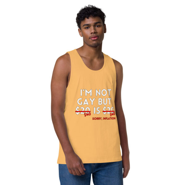 A person wearing the "I'm Not Gay Tank" in yellow with text: "I'm not gay but $20 is $20. $30 $40. Sorry, inflation.