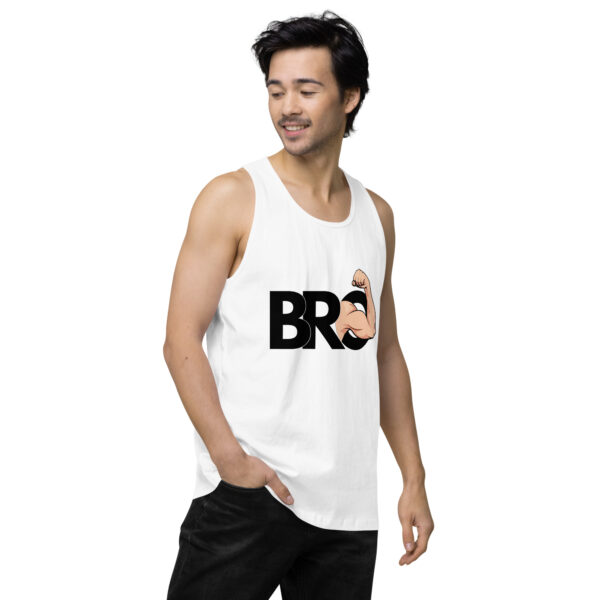 Man wearing the Bro Tank, which features a flexing arm graphic and the word "BRO," standing with one hand in his pocket.