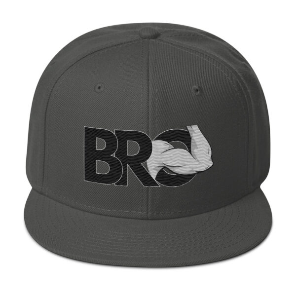 A dark gray snapback cap called the "Bro Hat," featuring "BRO" in block letters and a stylized letter "O" with a flexed bicep graphic.