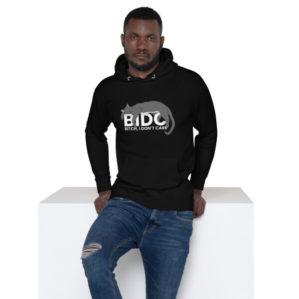 A man is wearing the BIDC Hoodie, which features a black cat design and "BIDC" text, as he stands against a white background.