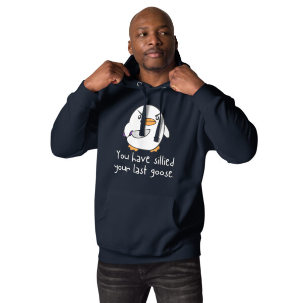 Someone wearing the "You Have Sillied Your Last Goose" hoodie, featuring a cartoon goose and a navy color scheme.