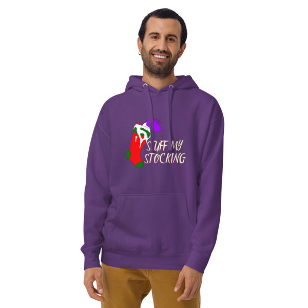 A man wearing a Unisex Hoodie in purple featuring the text "STUFF MY STOCKING" along with a vibrant graphic of a stocking.