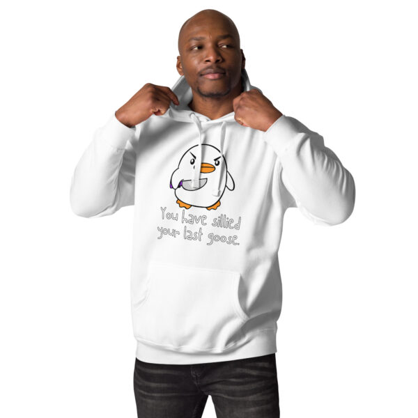 A man wearing a white hoodie featuring an illustration of an angry bird and the text "You Have Sillied Your Last Goose.