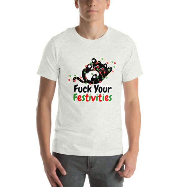 A person wearing a t-shirt emblazoned with the vibrant design and text "Fuck Your Festivities" on the front.