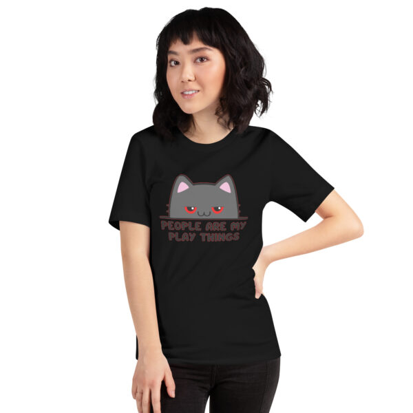 Person wearing a black T-shirt featuring a cartoon cat with the product name "People Are My Play Things.