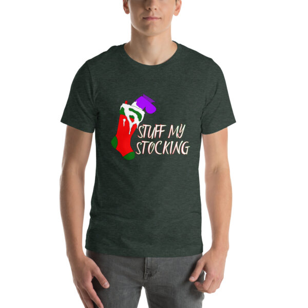 Individual dressed in a deep green T-shirt featuring a vibrant Christmas stocking design and the phrase "STUFF MY STOCKING," referencing the product called Stuff My Stocking.