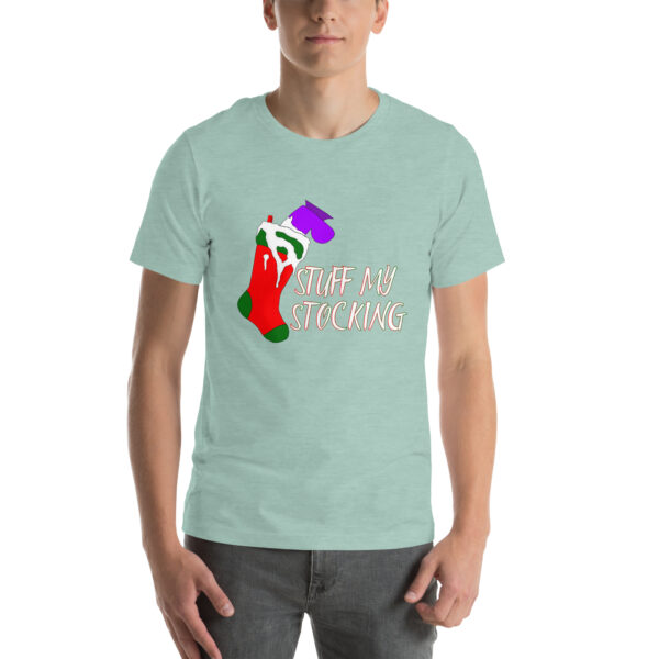 Person wearing a light green shirt with the "Stuff My Stocking" design featuring a red stocking and text.