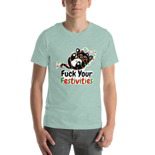 An individual donned a light green T-shirt featuring a festive graphic and the words "Fuck Your Festivities" from the product line named Fuck Your Festivities.