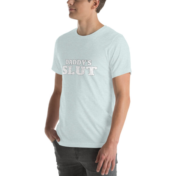 A person wearing a light blue "Daddy's Slut" t-shirt.