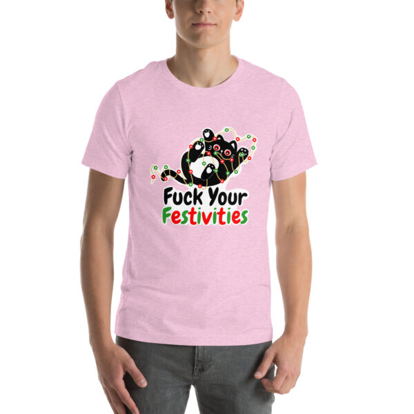 Person wearing a pink t-shirt featuring the "Fuck Your Festivities" design with a graphic of a grumpy cat.