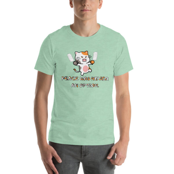 A person wearing a green t-shirt featuring the "Peace Was Never An Option" design, which showcases an angry cartoon cat holding knives.