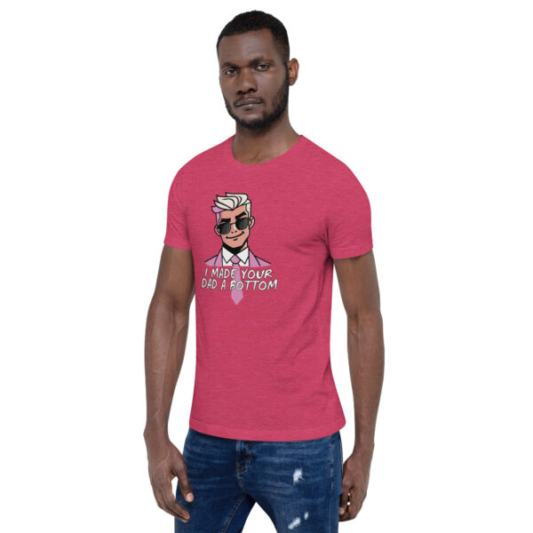 A person wearing a bold red "I Made Your Dad A Bottom" t-shirt features a graphic of a suited character sporting sunglasses.