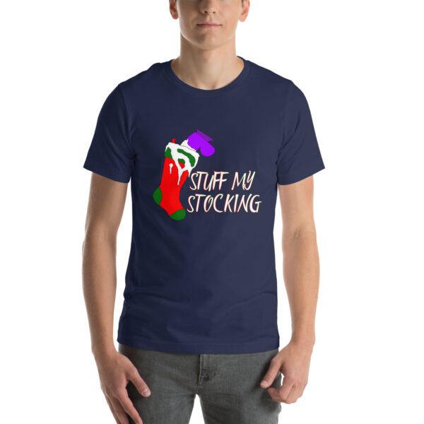 Individual donning the "Stuff My Stocking" T-shirt in navy blue, featuring a graphic of a stocking and accompanying text.