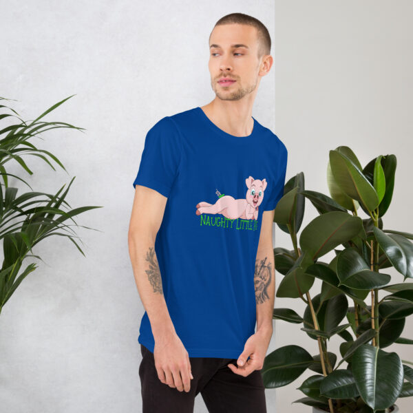 A man standing indoors near potted plants is wearing a blue t-shirt featuring the "Naughty Little Pig" cartoon design and text.