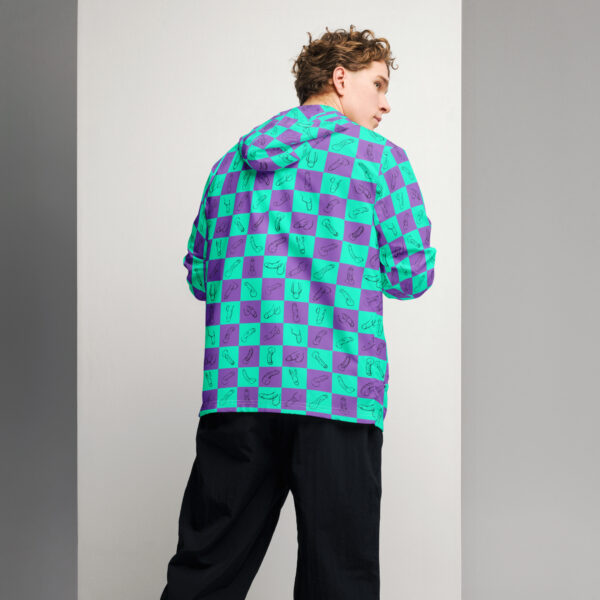 A person wearing the Checkered Drawn Penis Pattern hoodie, featuring colorful abstract designs, stands with their back turned in a neutral space.