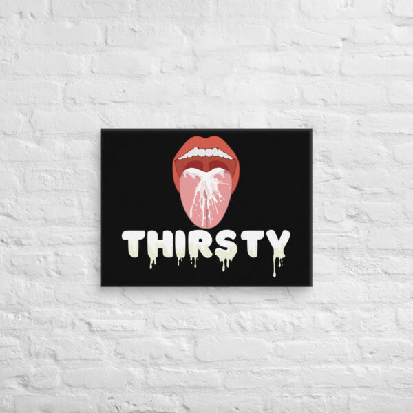 The "Thirsty Canvas" features an illustration of an open mouth with a liquid splash and the bold word "THIRSTY" below, all set against a black background, displayed on a white brick wall.