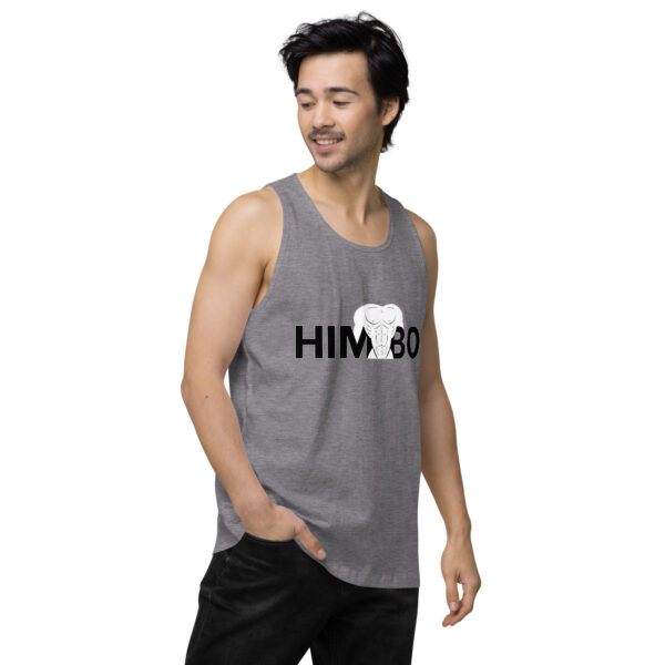 A person wearing the "Himbo Tank," a gray tank top featuring the text "HIMBO" and an owl graphic on the front.