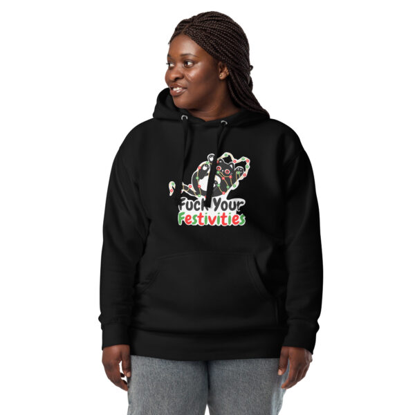 Someone wearing the "Fuck Your Festivities" Hoodie, featuring a dragon illustration, stands against a white background.