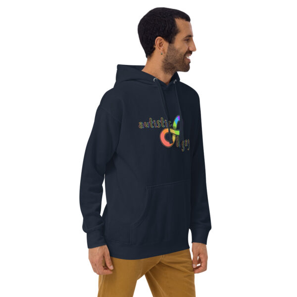 Man in an Autistic and Gay hoodie with rainbow infinity symbol, standing sideways.